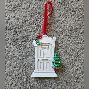 Festive Door Ornament with Red Ribbon